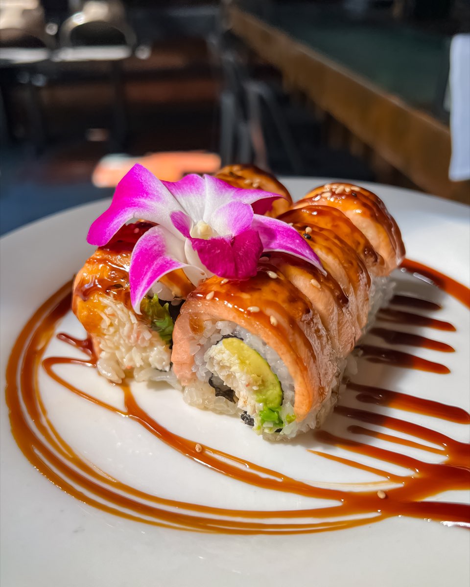 The Baked Salmon Roll, glazed salmon laid over the top and finished with an orchid